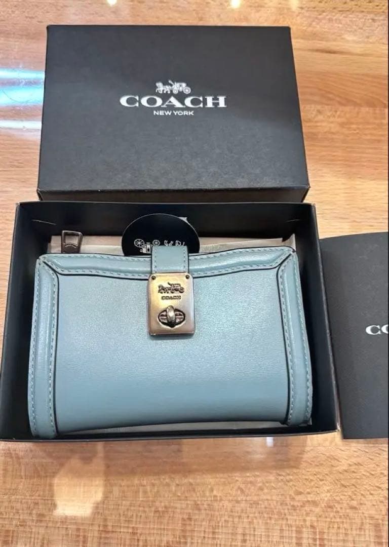 COACH 二つ折り財布 ライトブルー